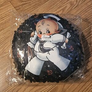 Sourpuss baby sailor, buoy boy, nautical navy pillow. Punk Kitsch Rockabilly